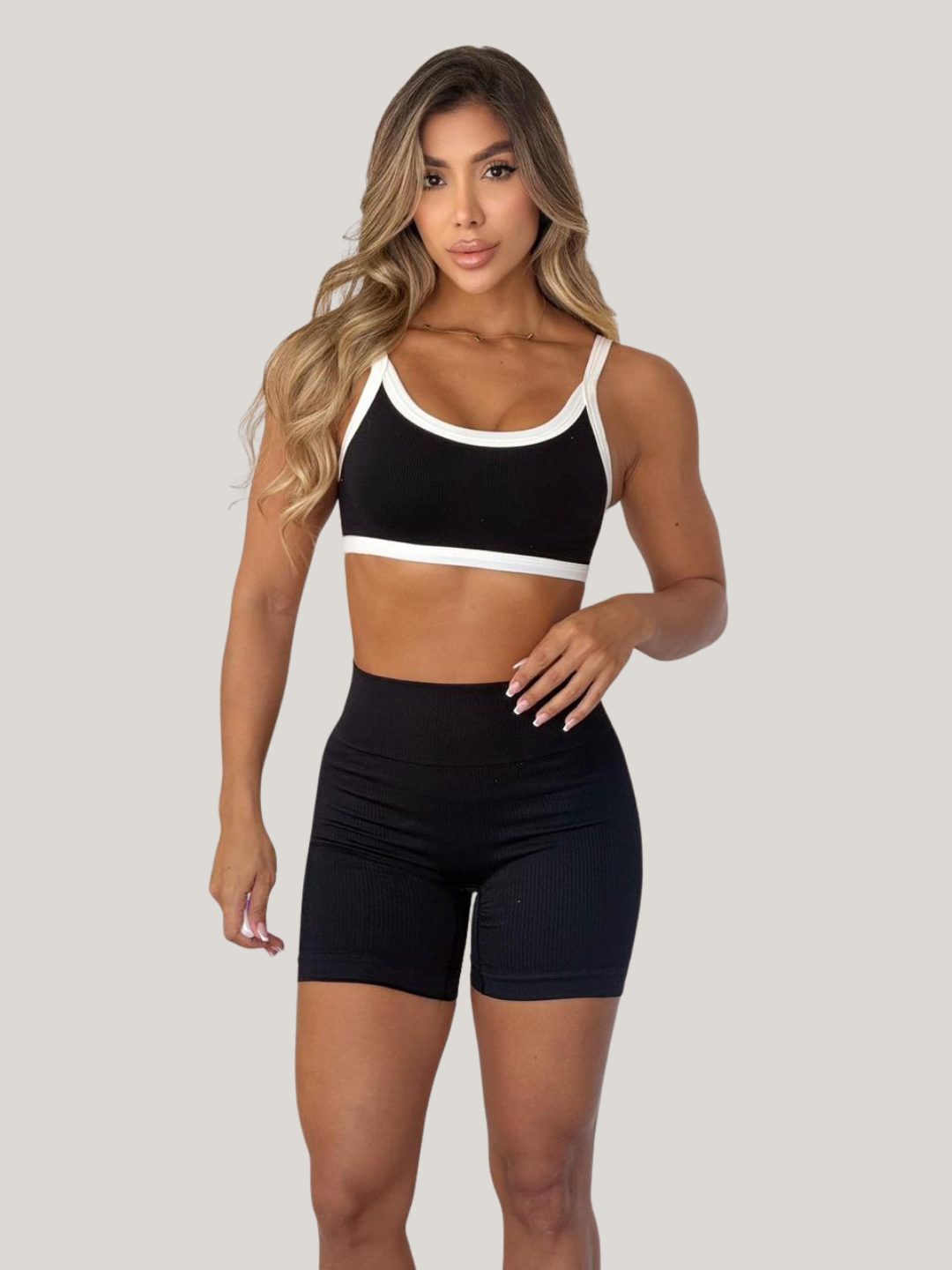 SET SHORT + TOP NEGRO CON SESGO BLANCO