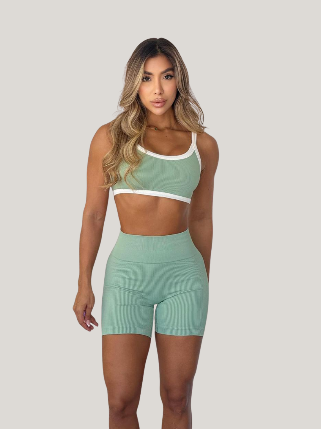 SET SHORT + TOP NEGRO CON SESGO VERDE